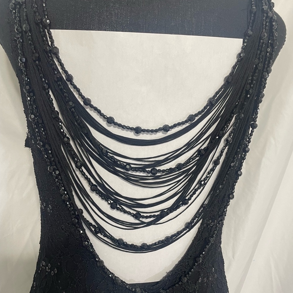 Reign On. Black sequin lace formal dress. Beaded back accent. Size 11-12